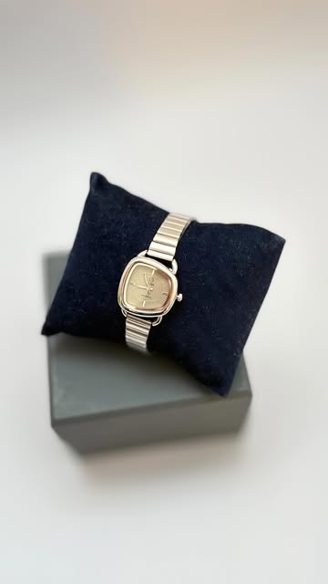 ساعت مچیزنانه دفرمه-برند  فلورا-بند استیل-قفل ریلی قابل تنظیم-رنگ ثابت